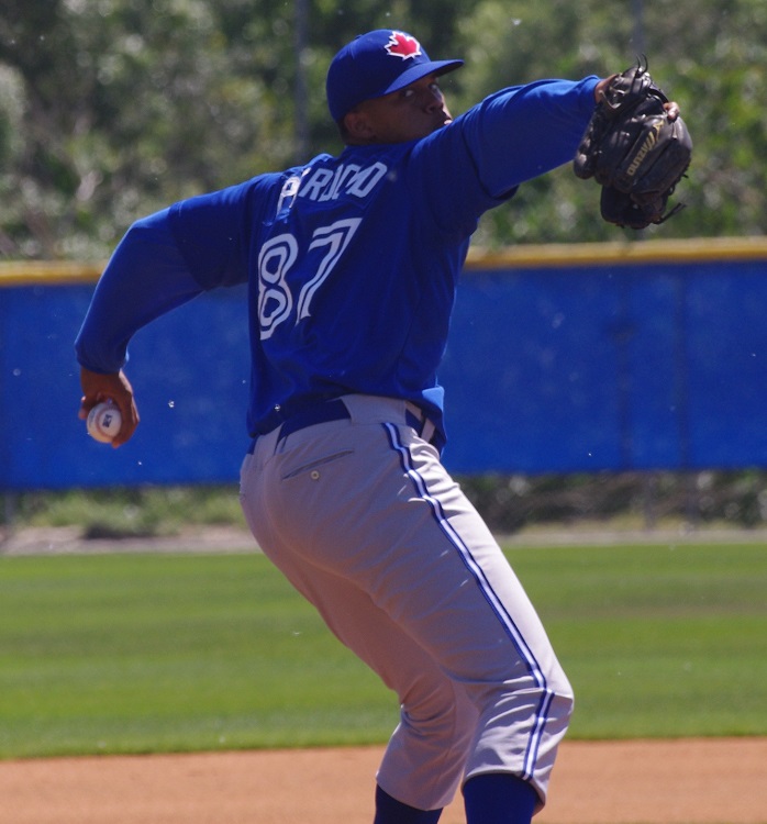 Angel Perdomo pitching an extended spring training game in 2016.