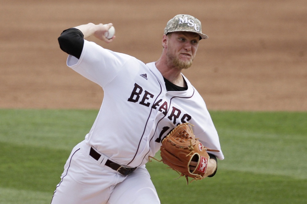 Missouri State pitcher Jon Harris throws against Arkansas during the second inning in a super regional of the NCAA college baseball tournament in Fayetteville, Ark.